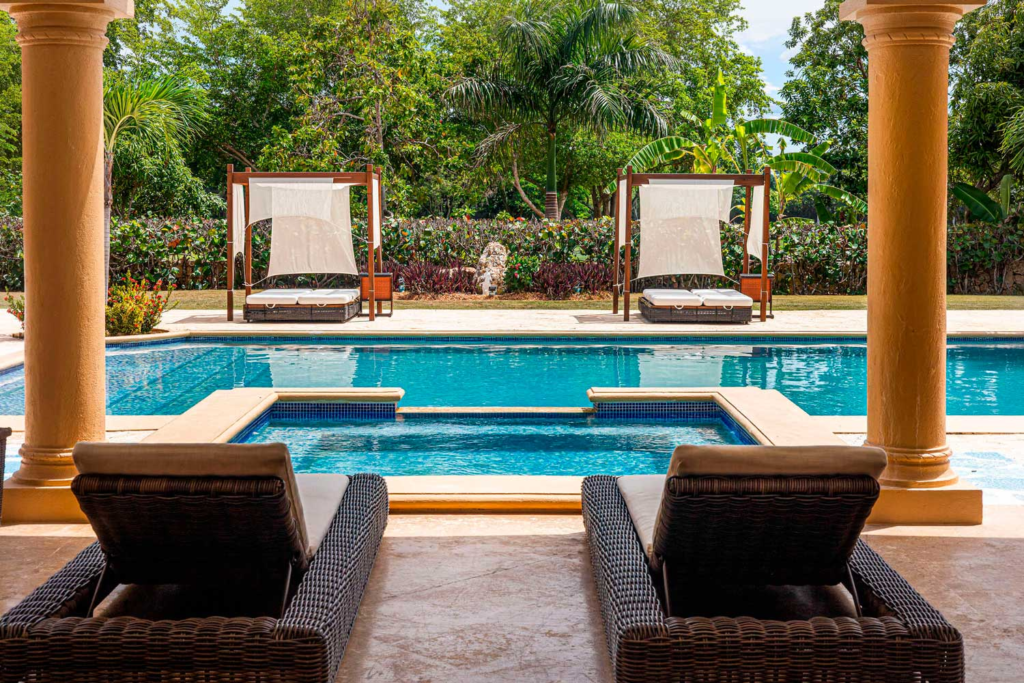 Swimming pool viewed from the covered terrace