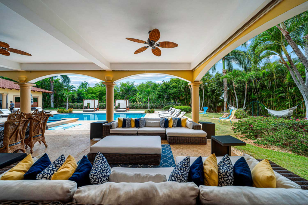 Covered lounge terrace beside the pool