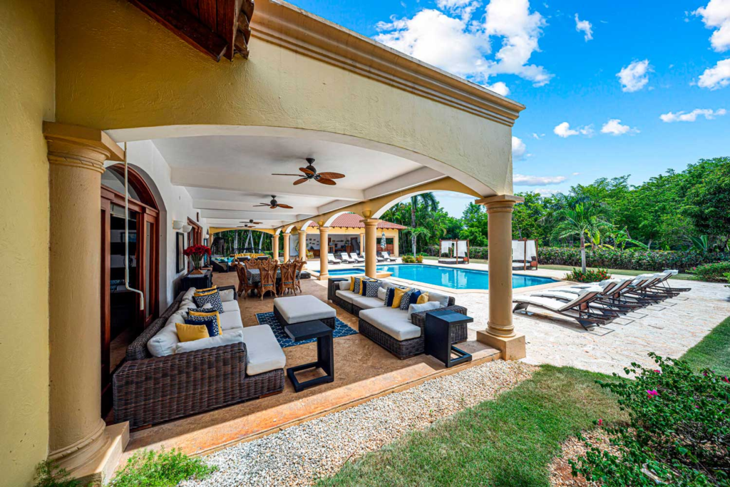 Covered terrace opening onto the pool garden