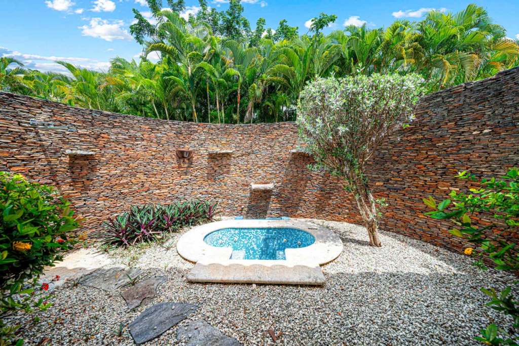 Small water feature in a walled garden