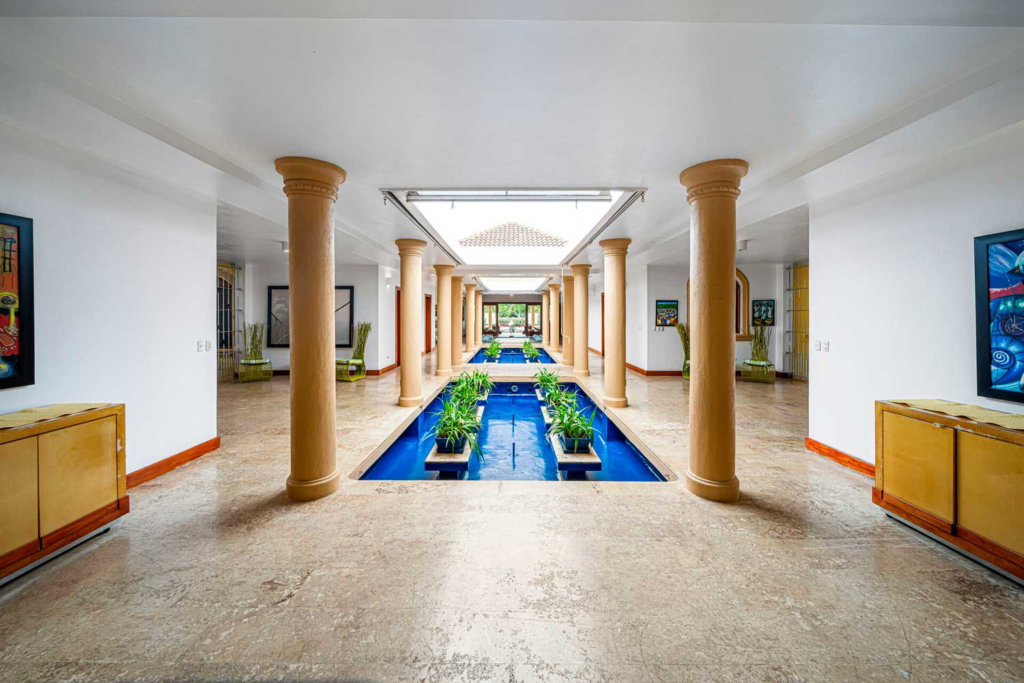 Columned gallery with a central water feature