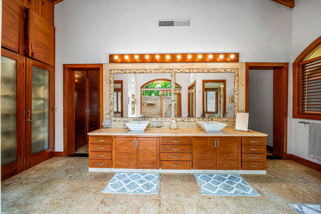 Bathroom with double vanity and large mirror