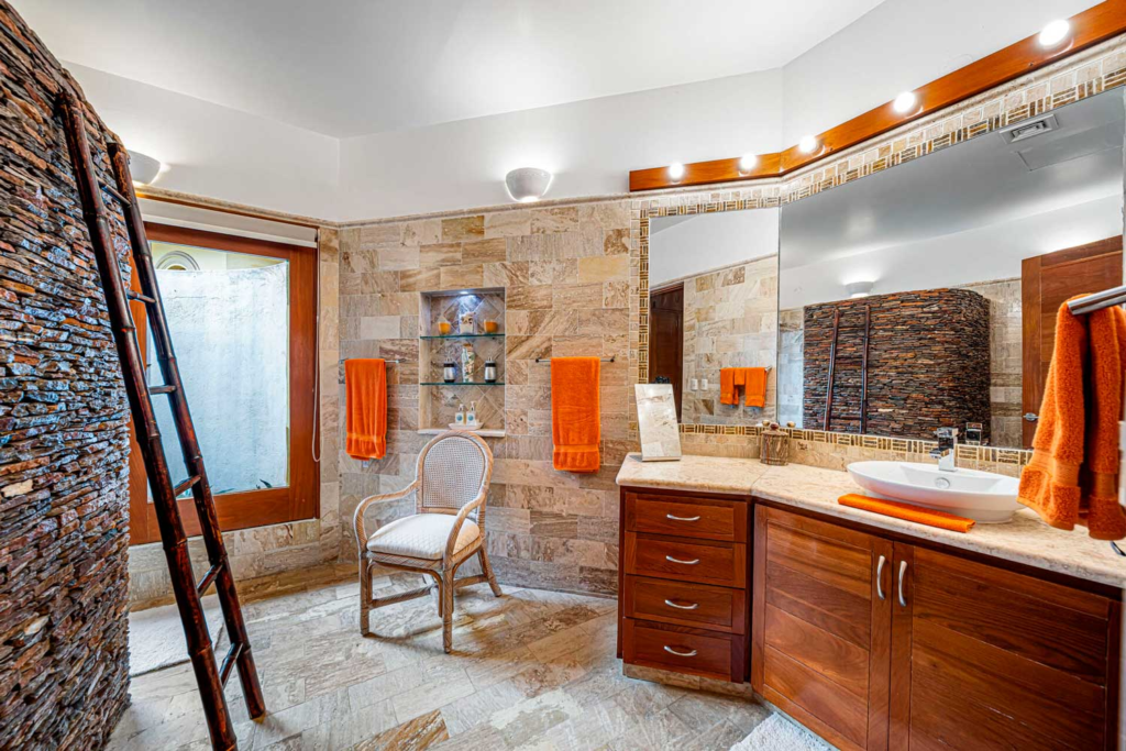 Bathroom with vanity and stone finishes
