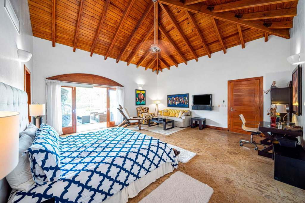 Bedroom with blue-patterned bed linen