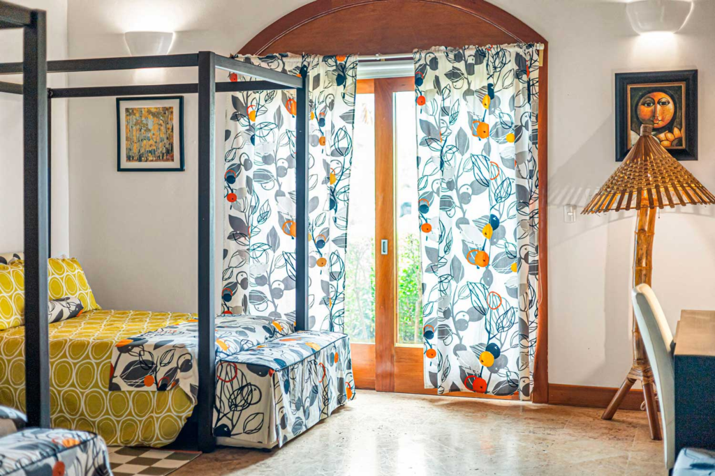 Bedroom windows with patterned curtains